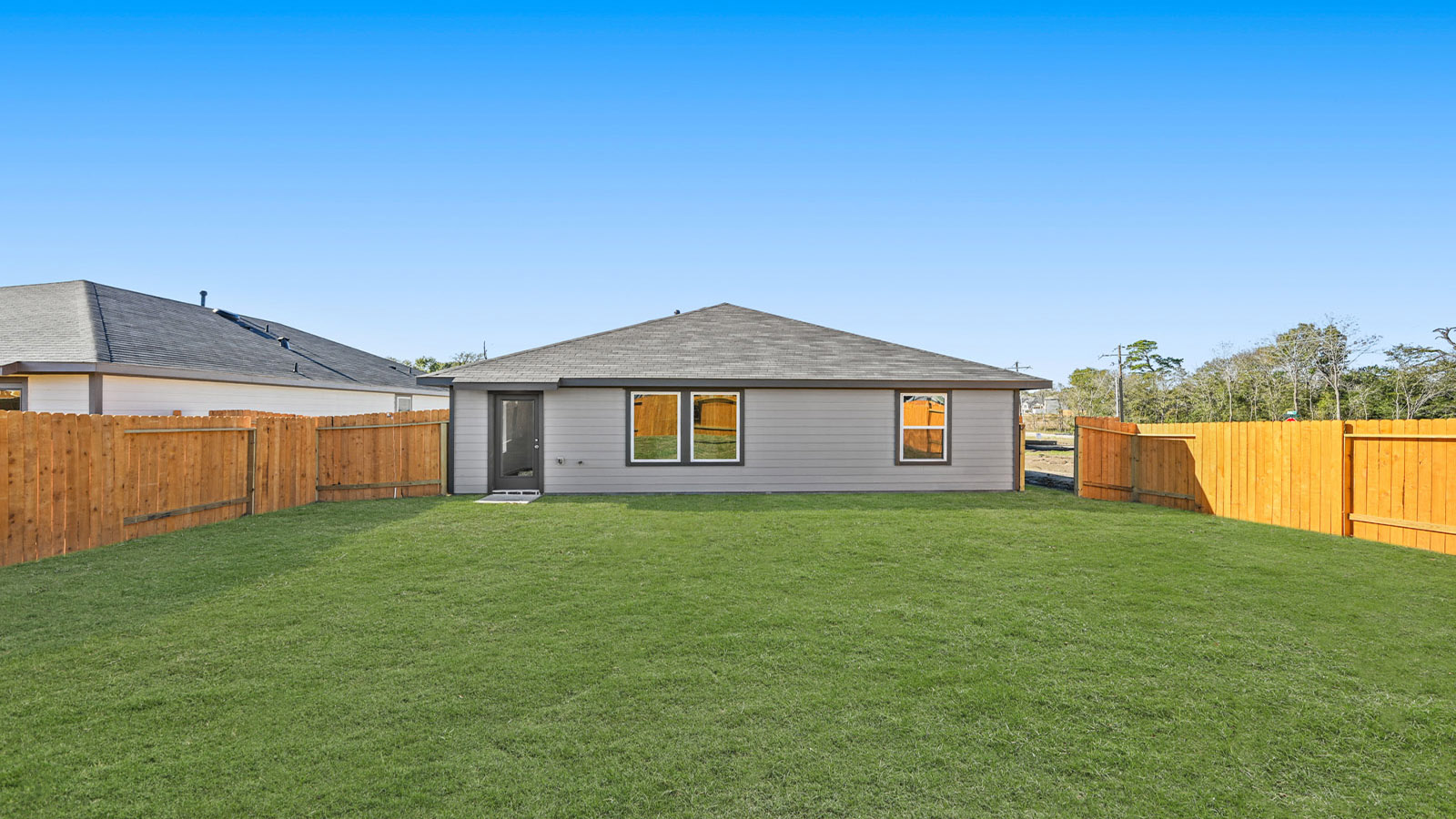 backyard and back door of home