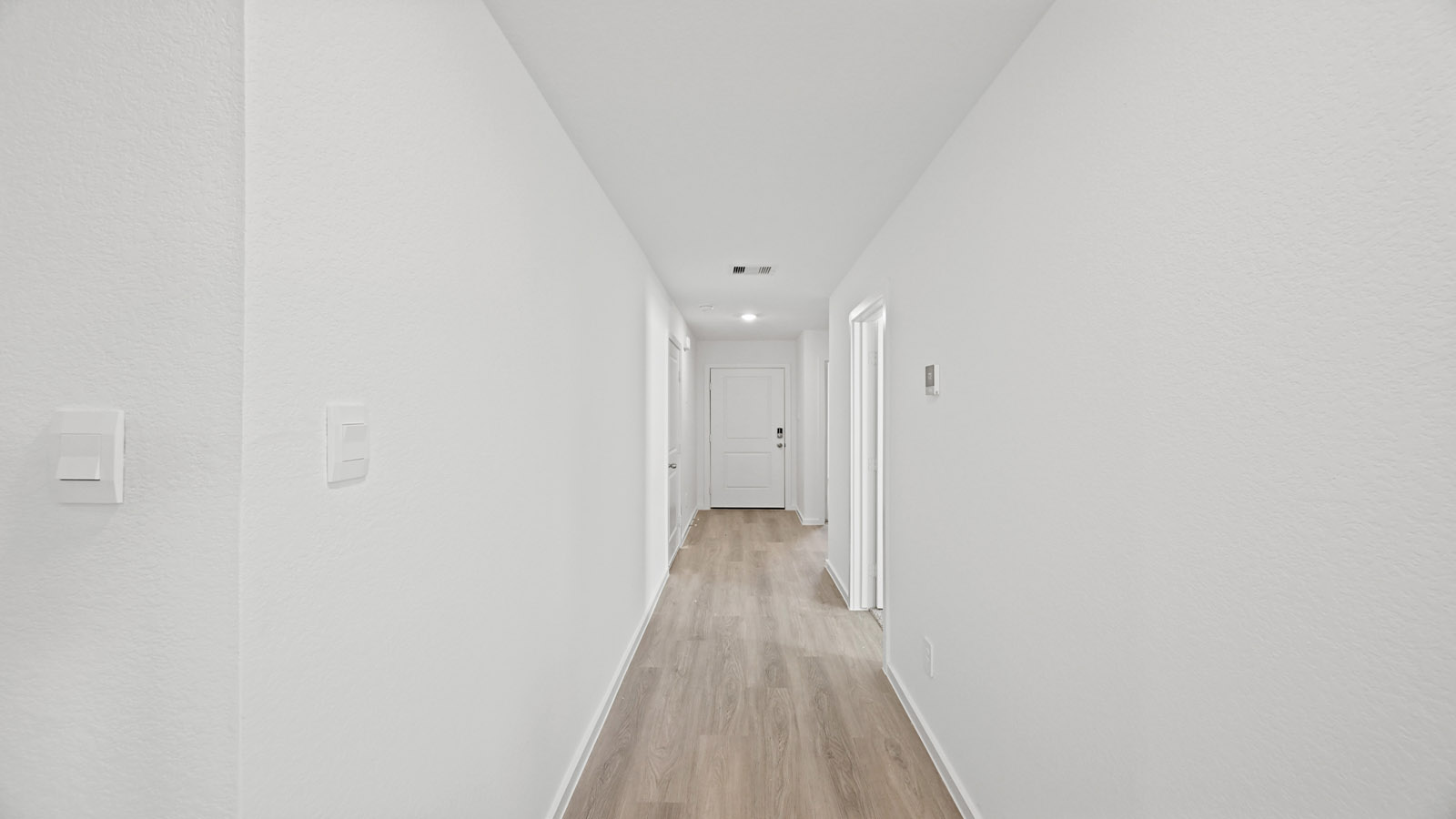 Entry hallway with vinyl flooring