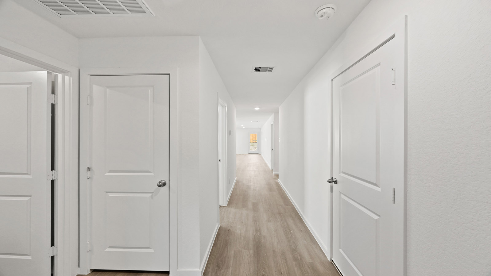 Entry hallway with vinyl flooring