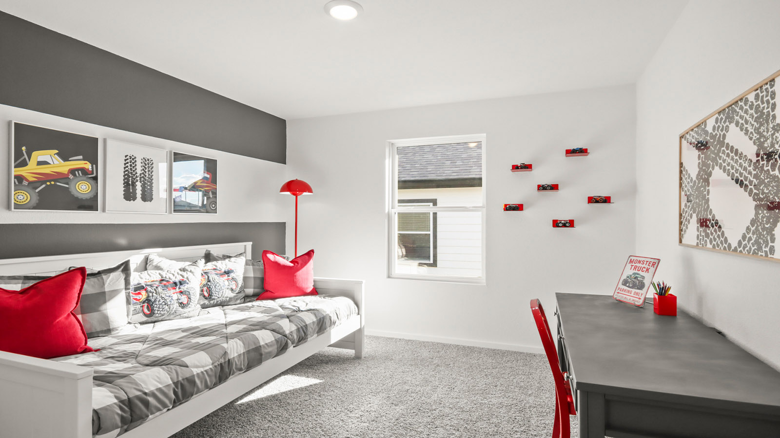 Secondary bedroom with carpet flooring