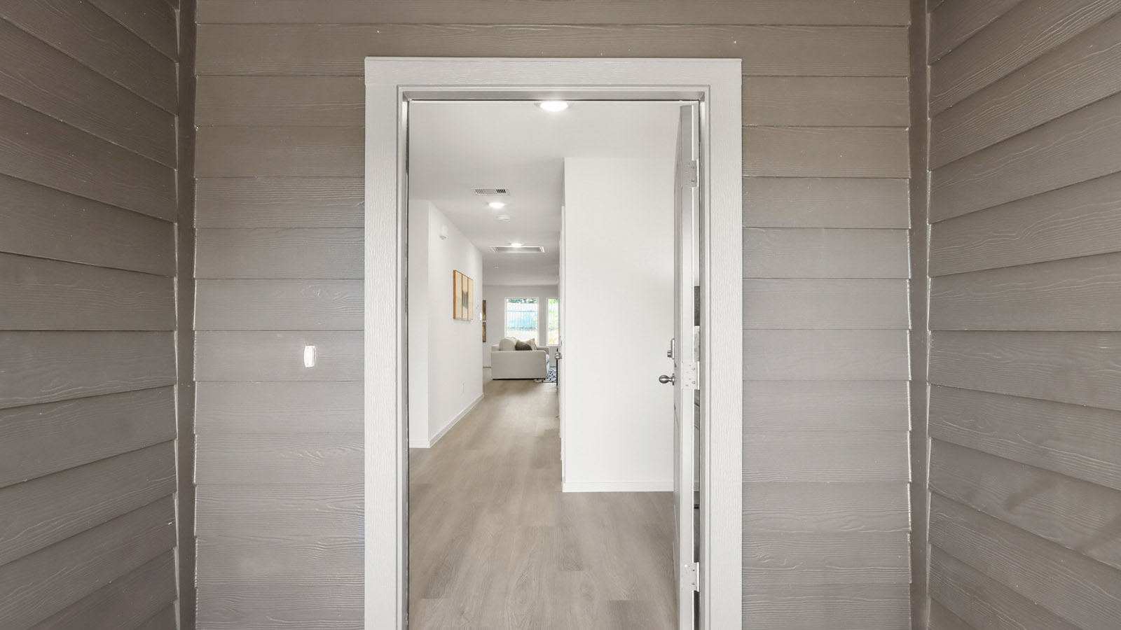 Entry hallway with vinyl flooring