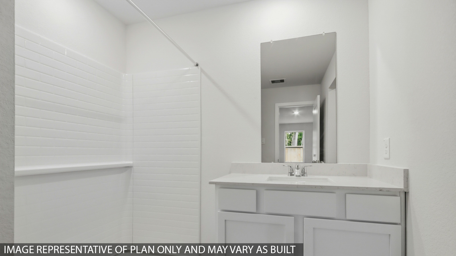 Primary bathroom with double sinks with quartz counter tops in Willis TX