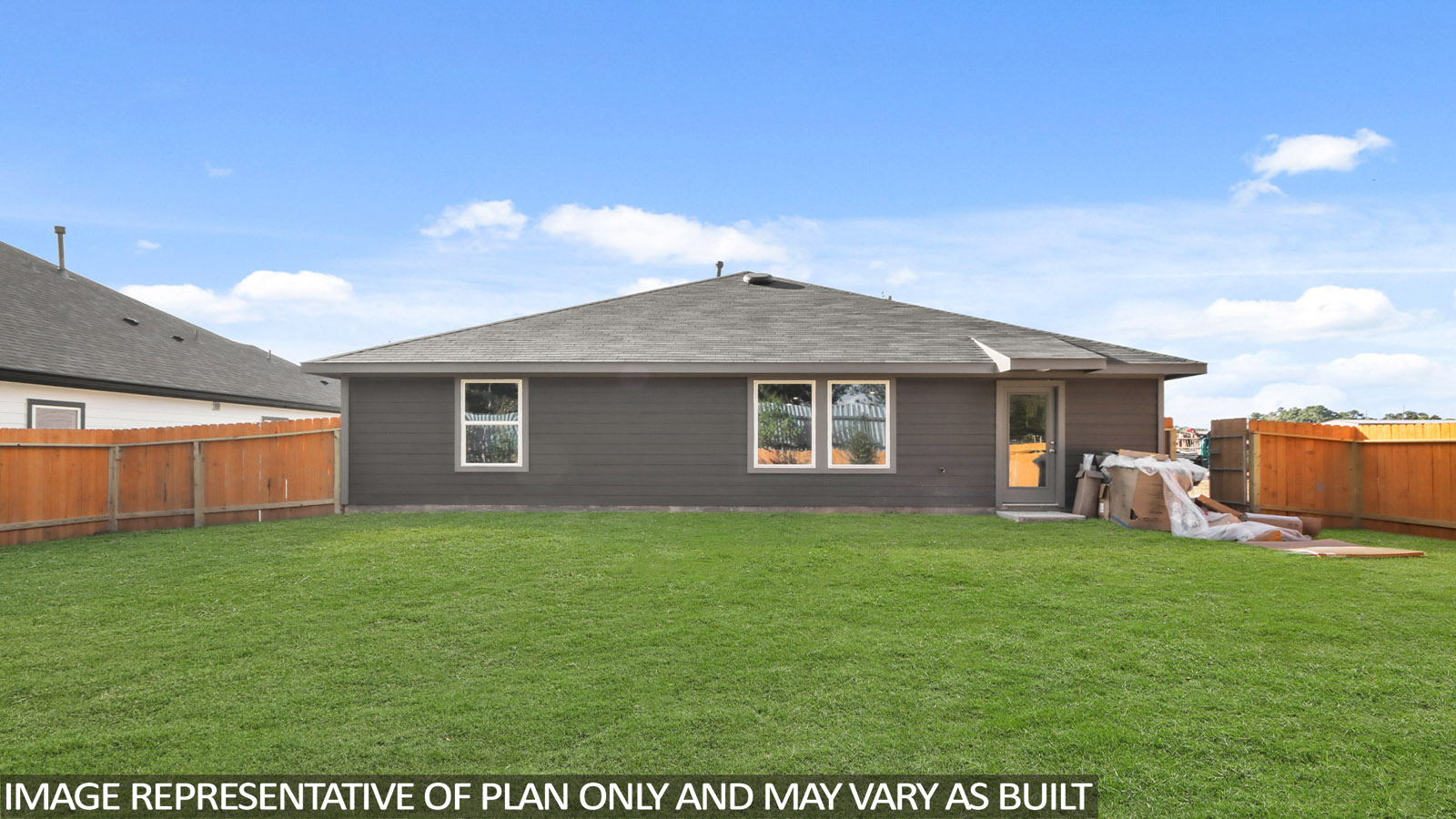 back of house with james hardie siding and glass back door