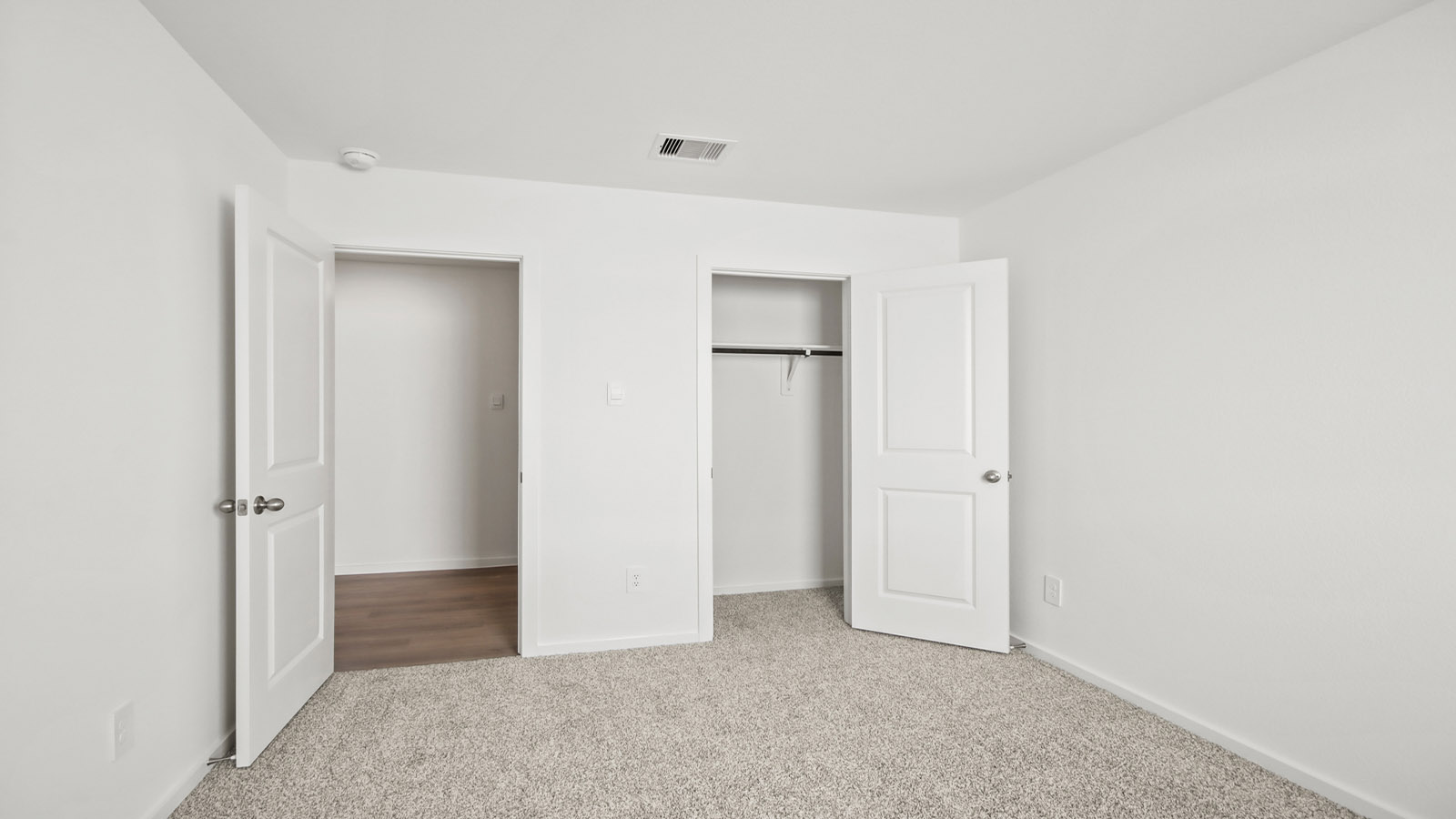 Secondary bedroom with bright window