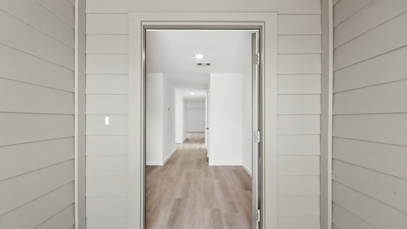 Entry hallway with vinyl flooring