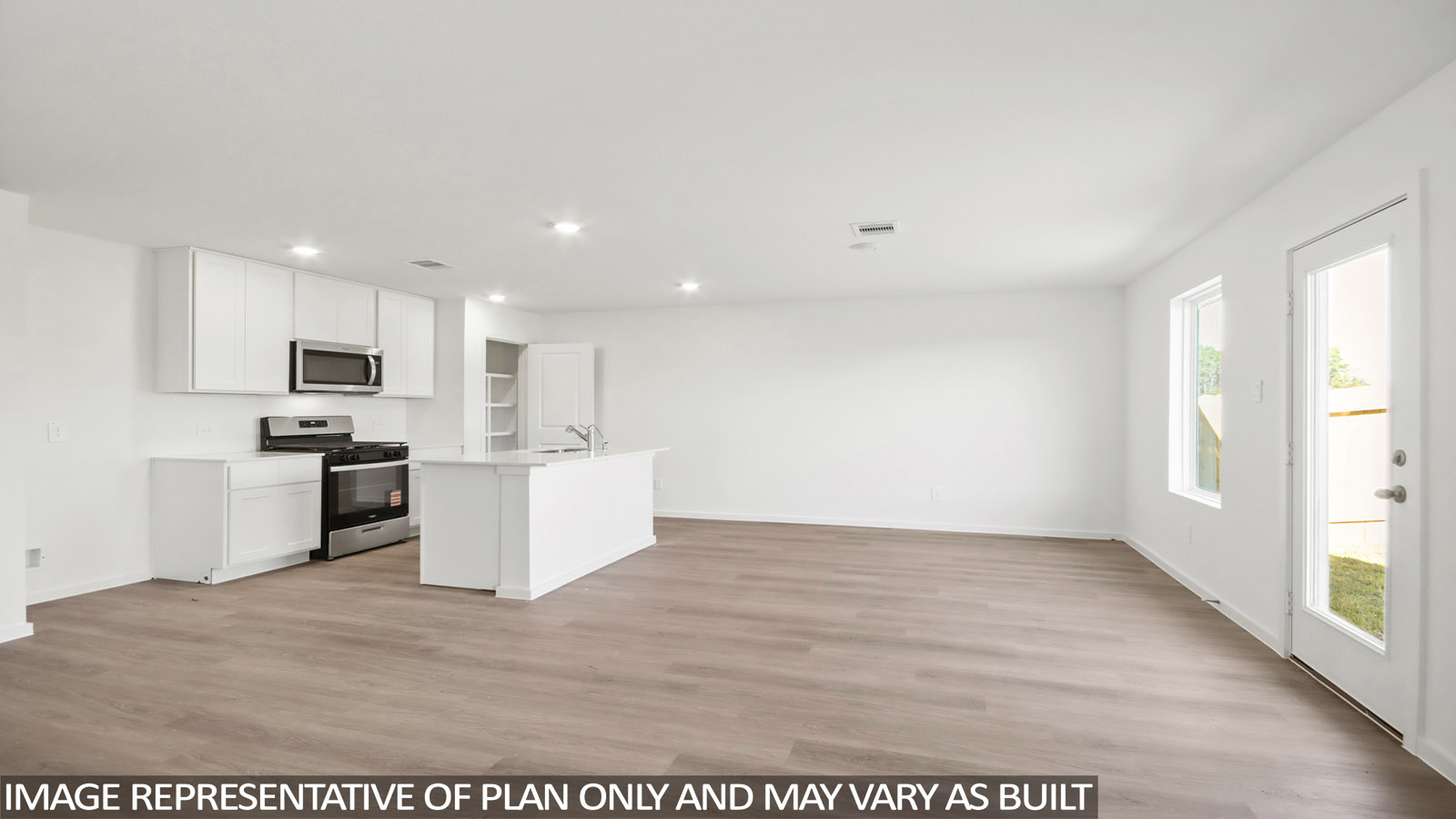 Open concept living, dining, and kitchen area