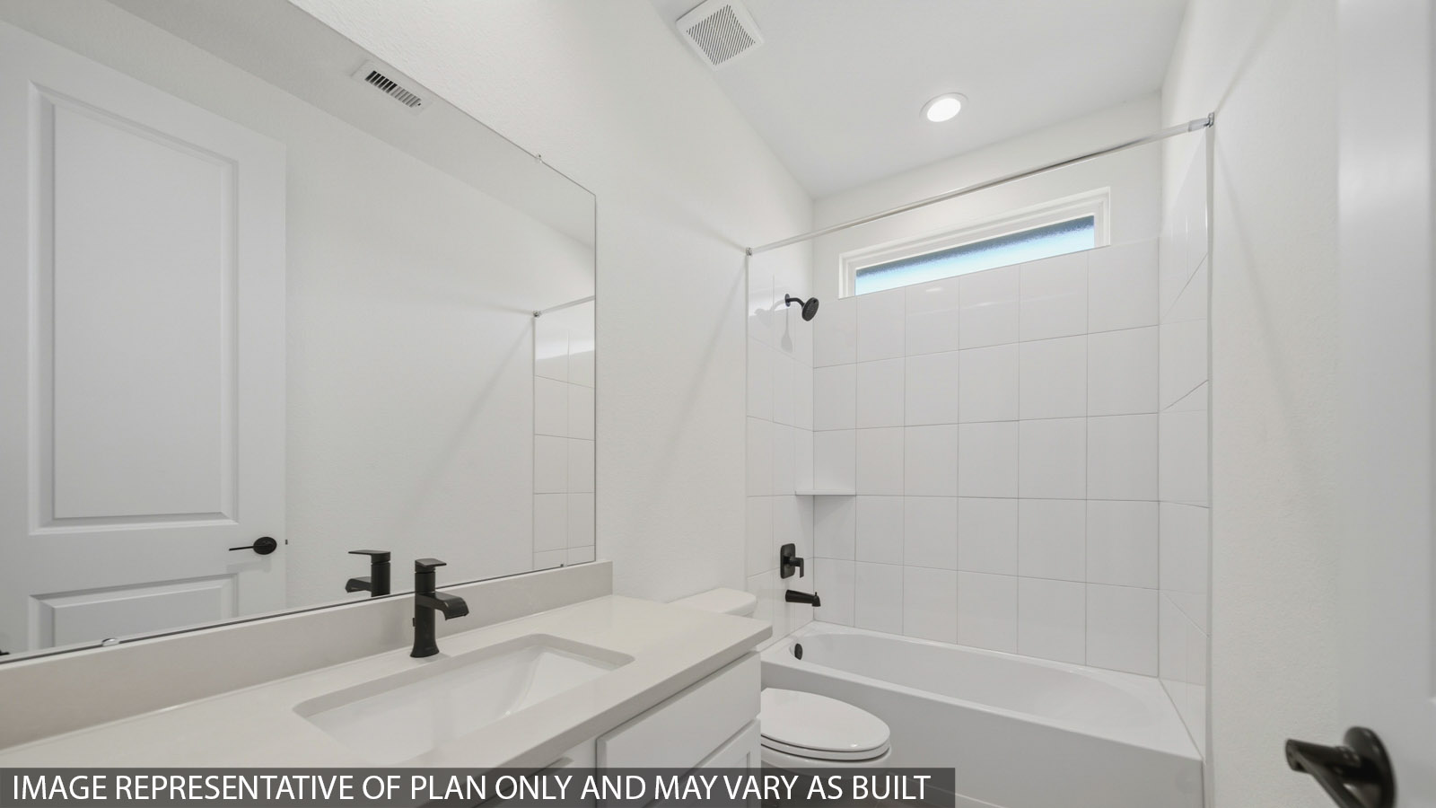 Secondary bathroom with tub/shower combo with quartz counter tops in Magnolia TX