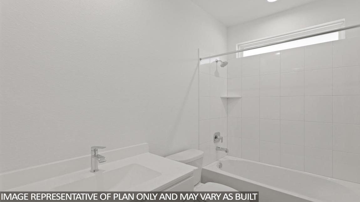 Secondary bathroom with tub/shower combo with quartz counter tops in Magnolia TX