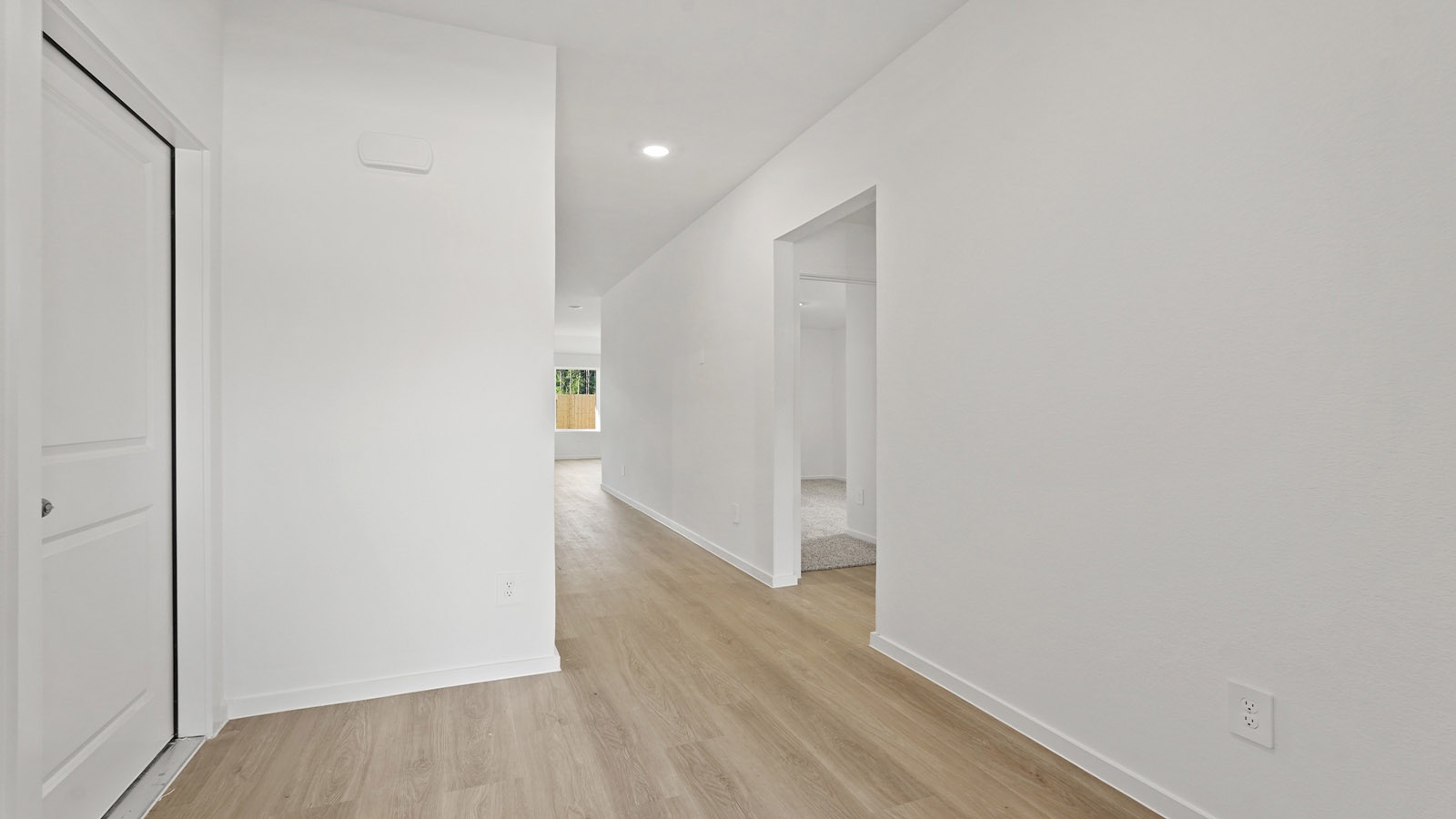 Entry hallway with vinyl flooring