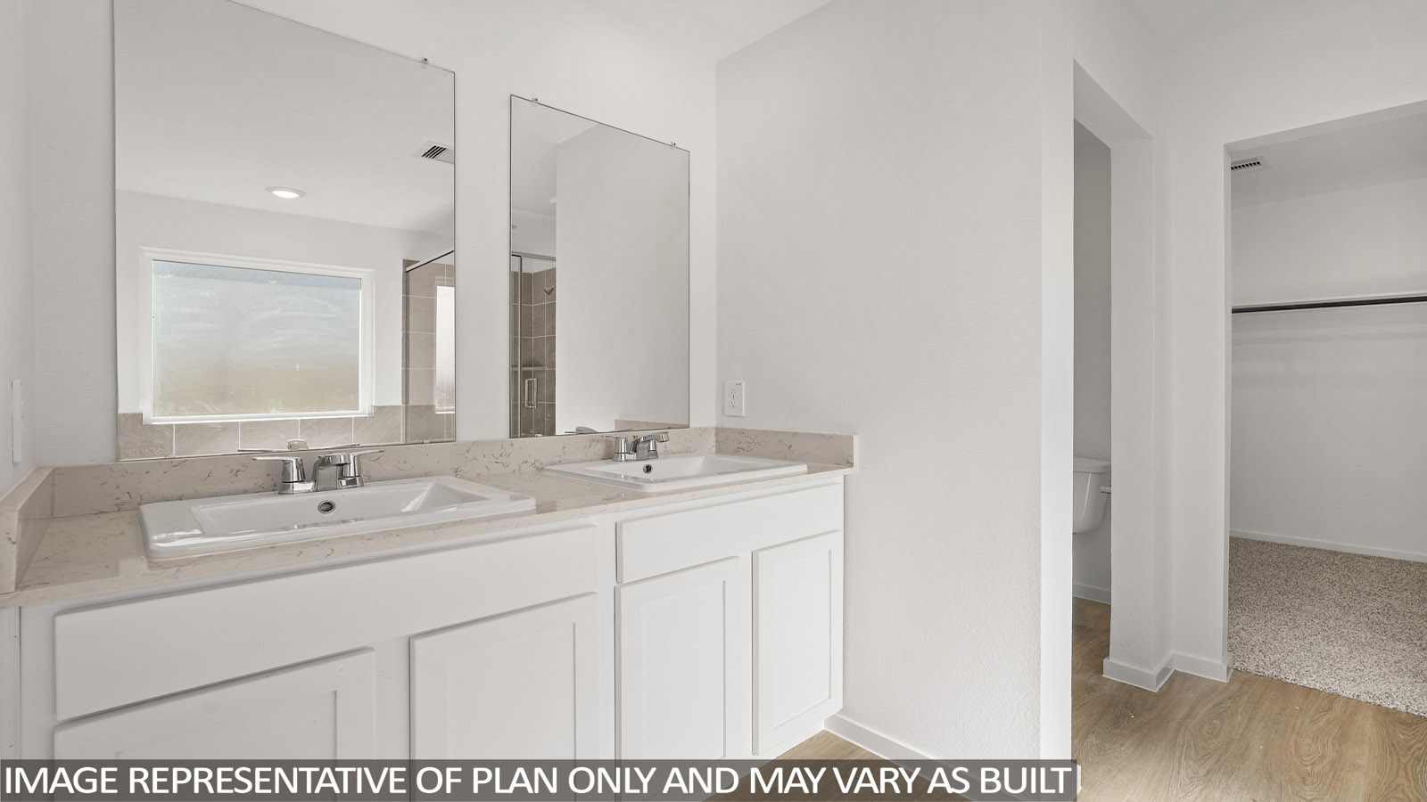 Primary bathroom with soaker tub and tile shower with semi frameless glass in New Waverly TX