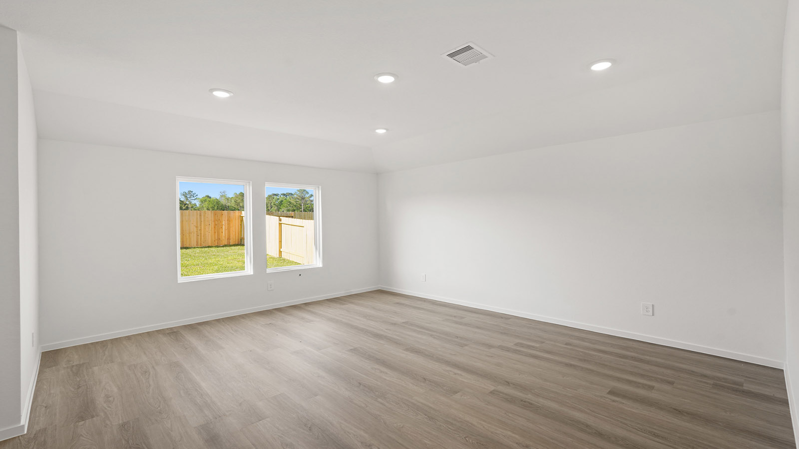 Open concept living, dining, and kitchen area