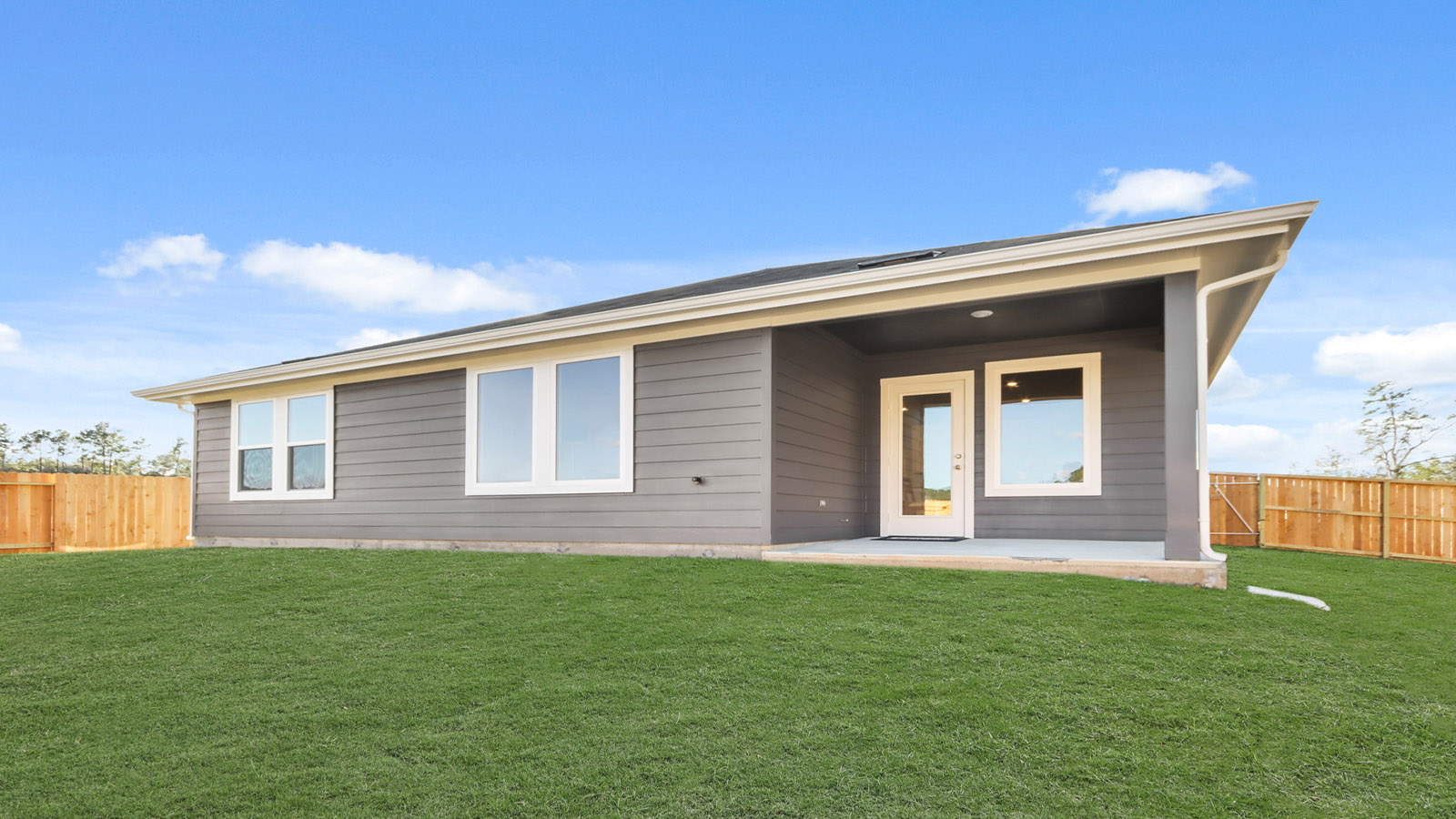 covered patio with overhead lighting