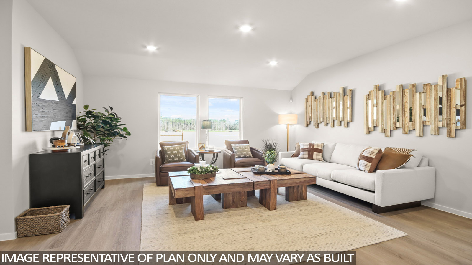 Spacious living area with vinyl flooring