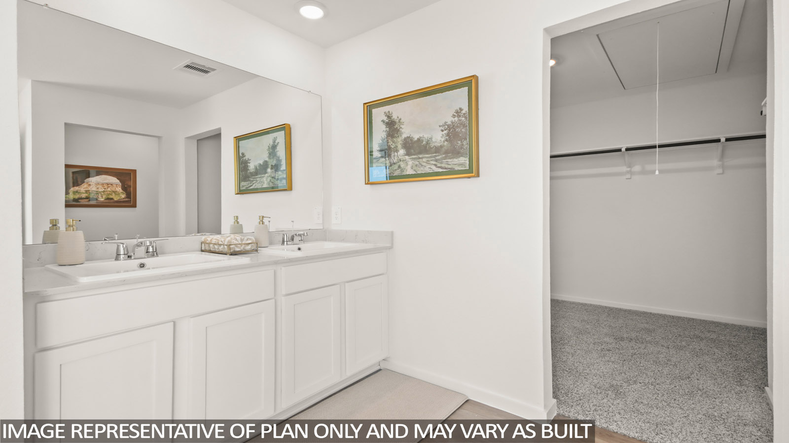 Primary bathroom with double sinks with quartz counter tops in New Waverly TX