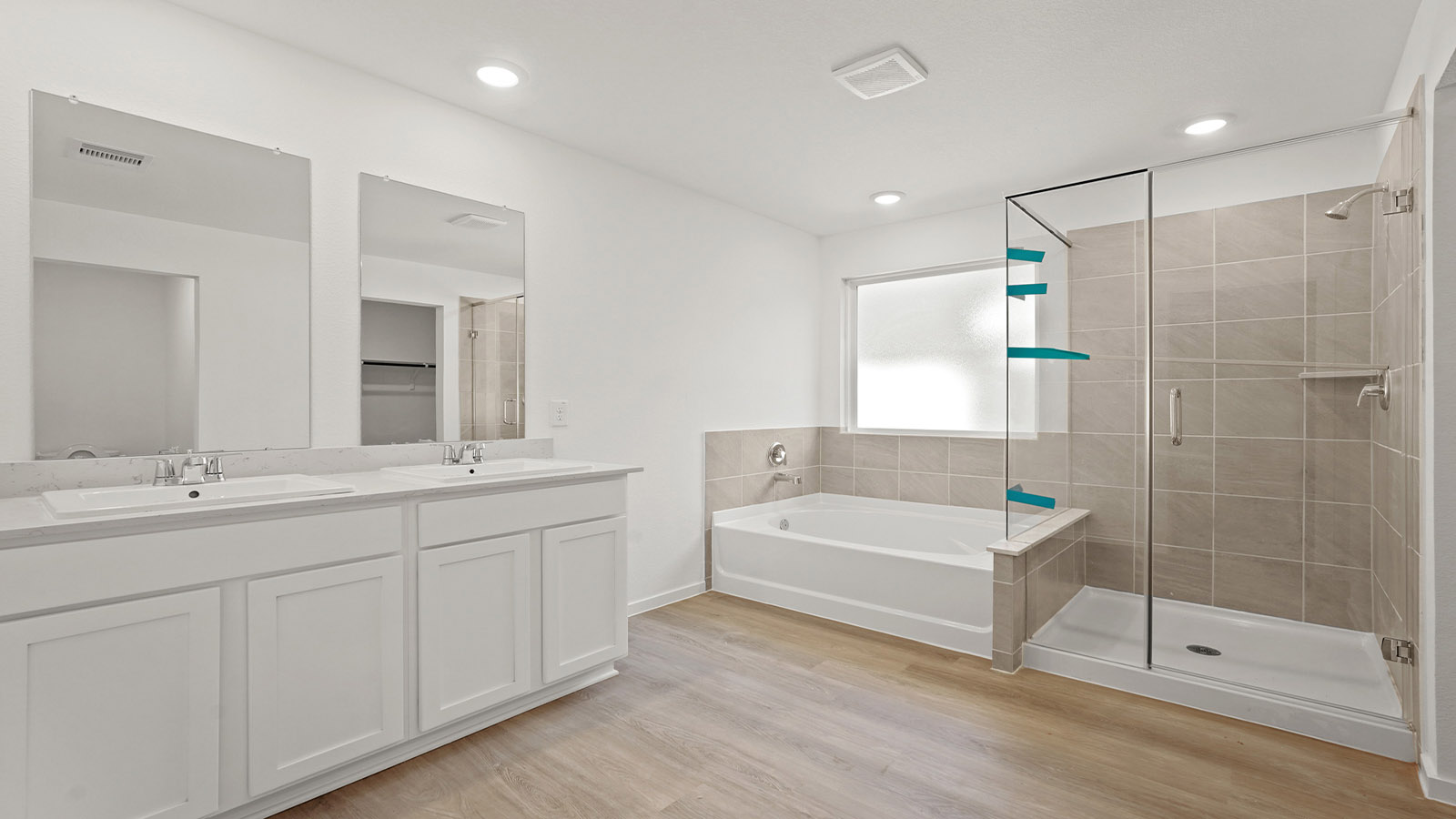 Primary bathroom with tub and shower