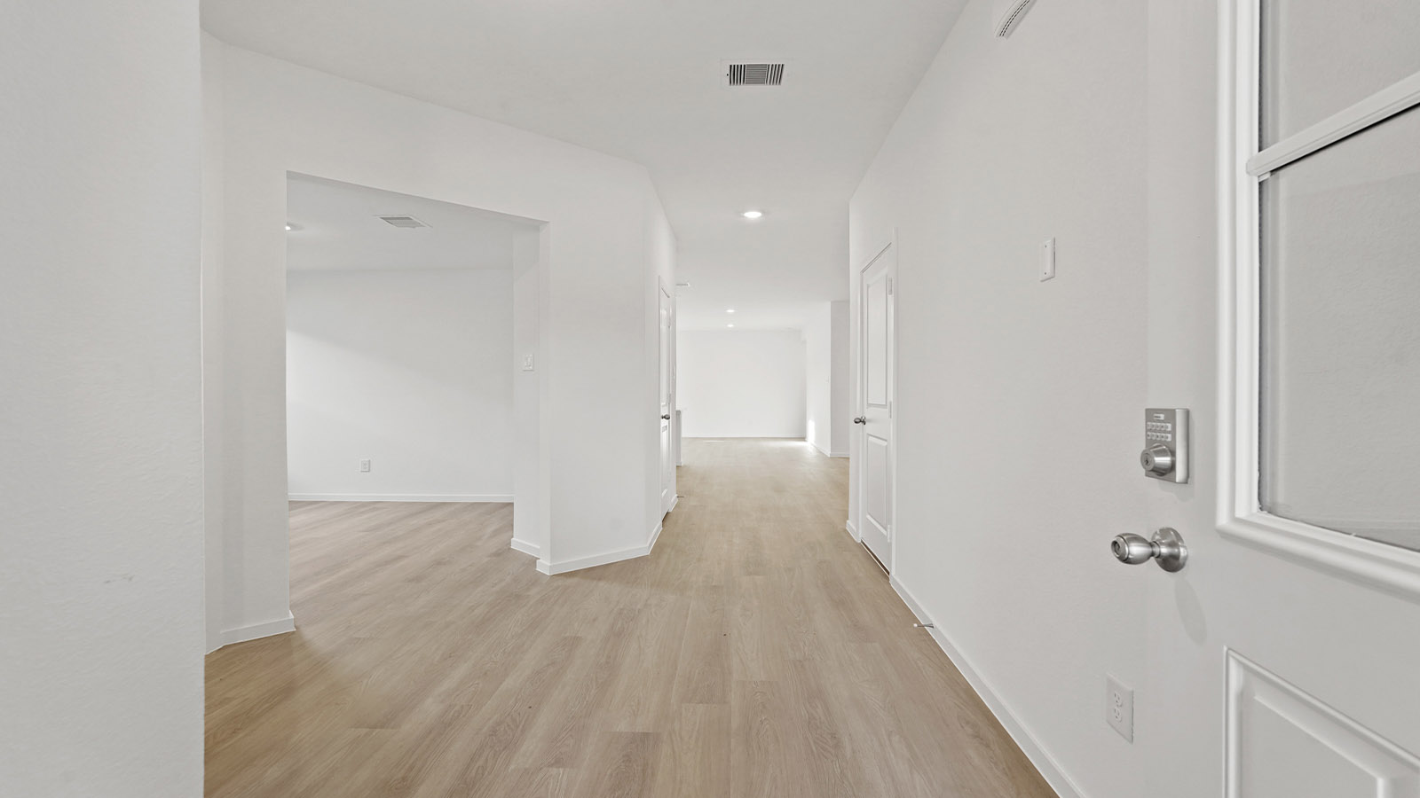 Entry hallway with vinyl flooring