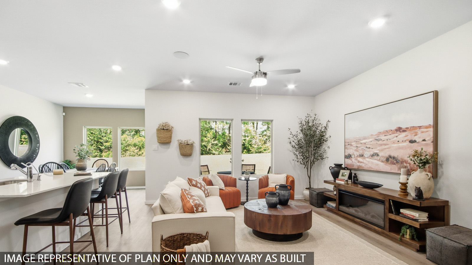Spacious living area with vinyl flooring and bright windows in New Waverly TX