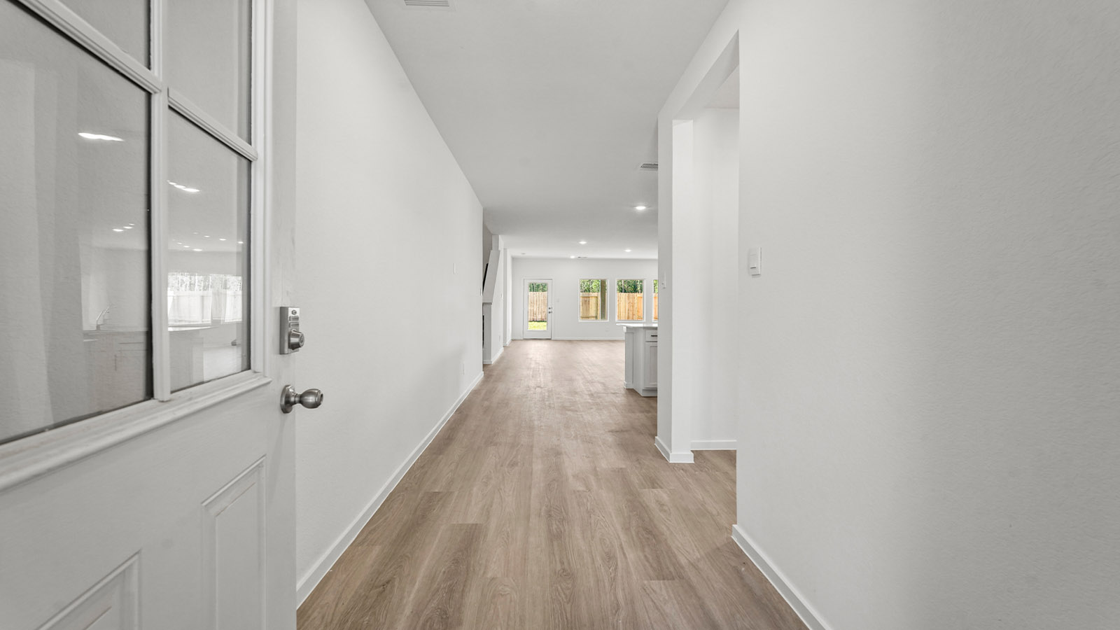 Entry hallway with vinyl flooring
