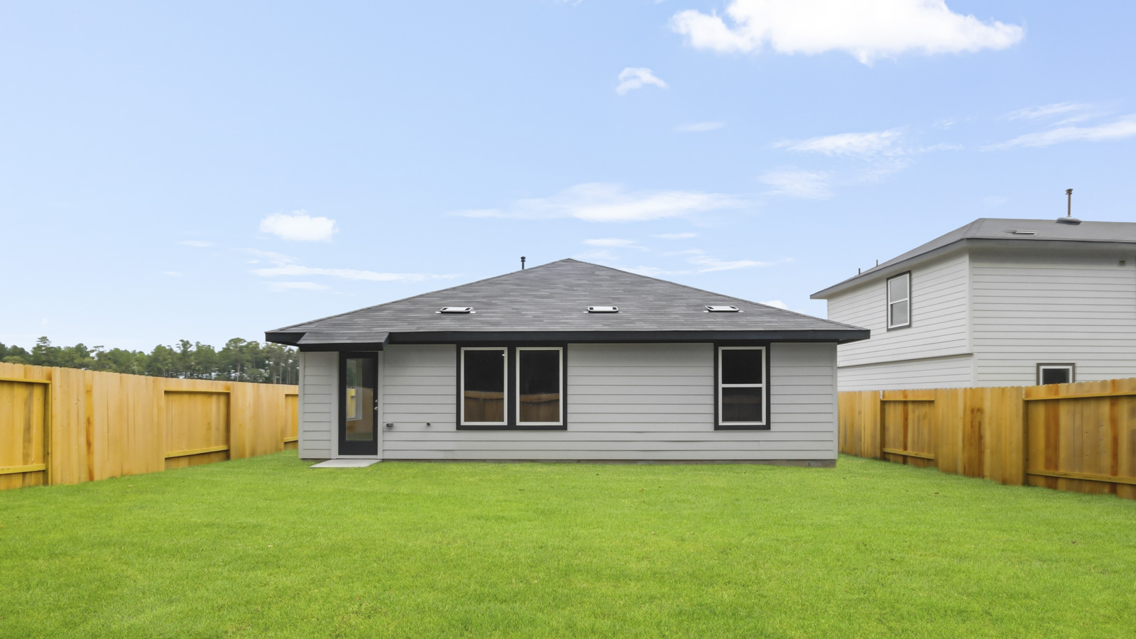 back of house with james hardie siding and glass back door
