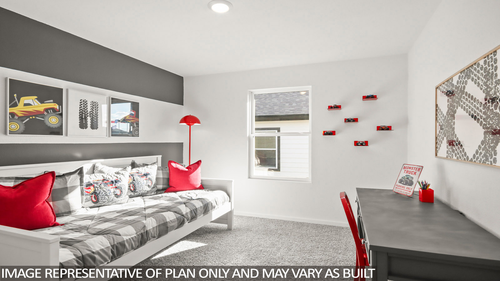 Secondary bedroom with carpet flooring