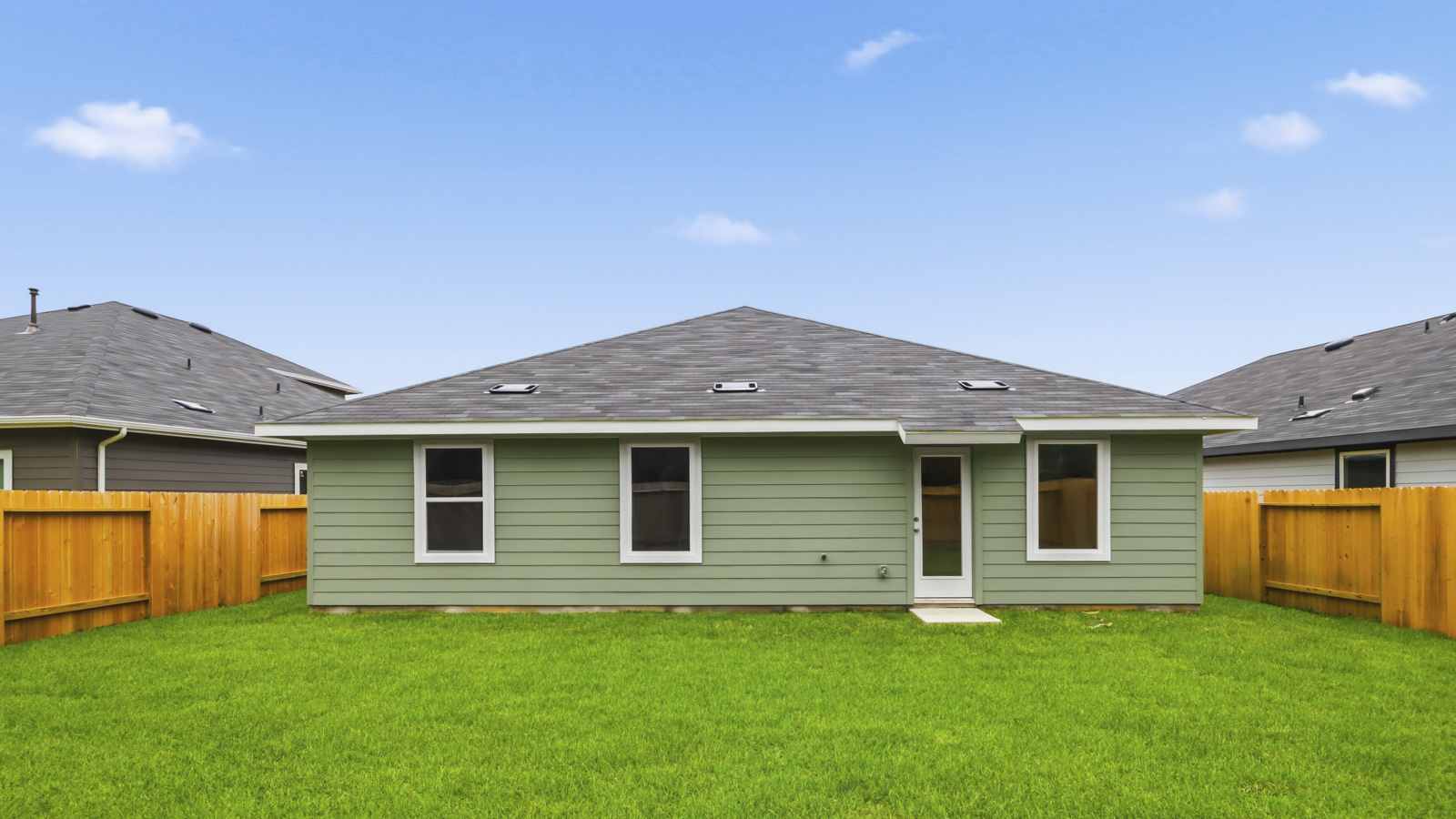 Backyard and back view of house