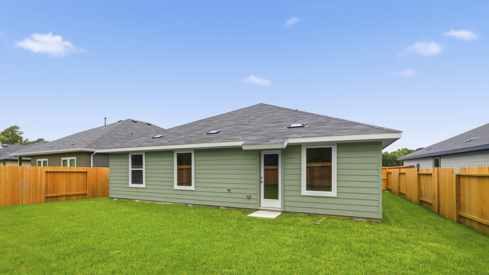 Backyard and back view of house