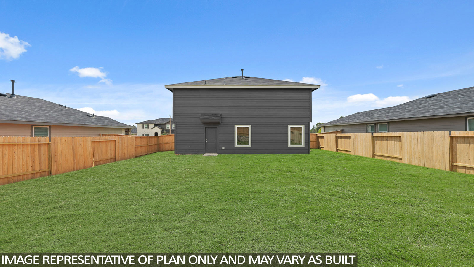 back of house with jamies hardie siding and overhead lighting