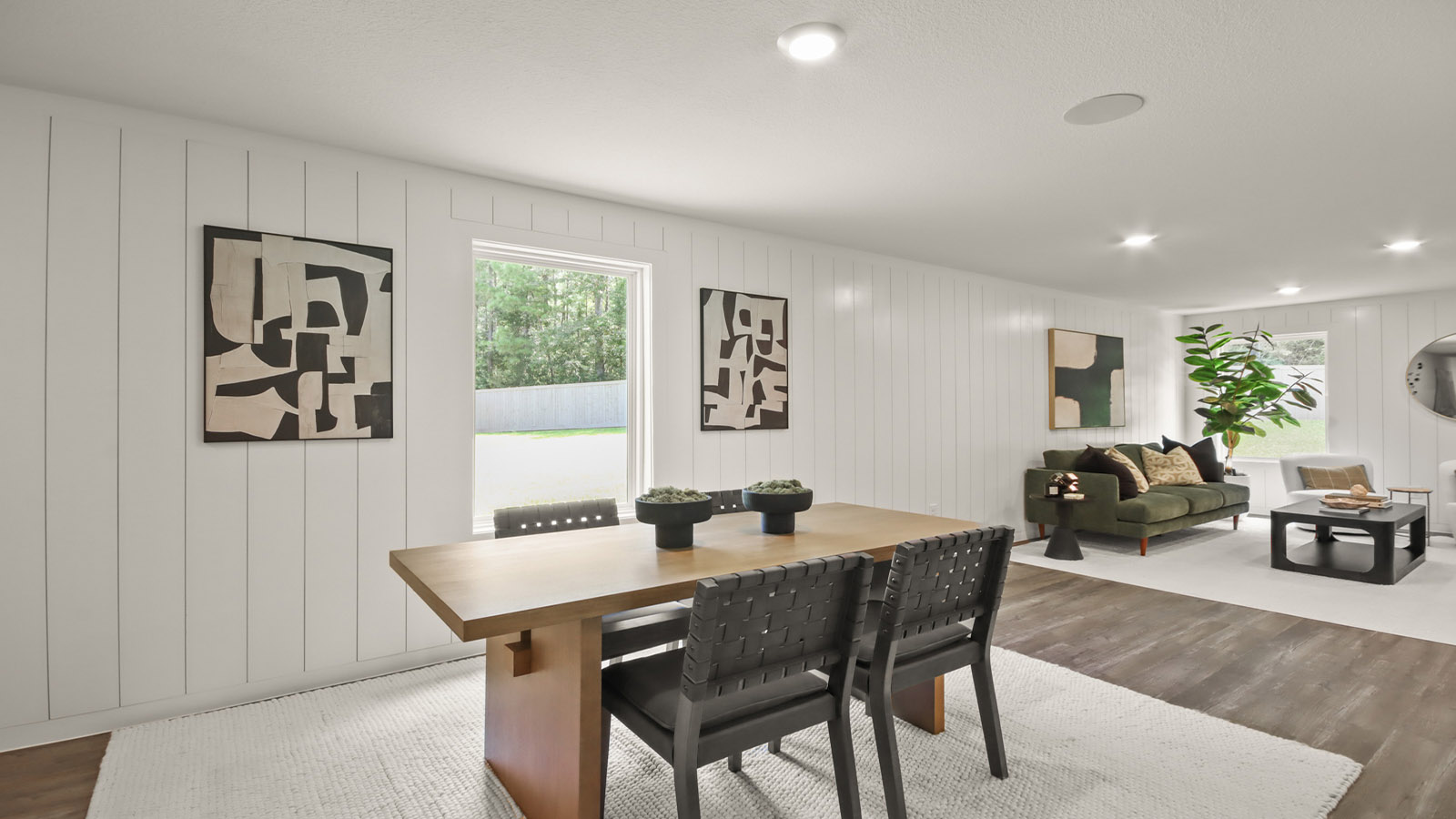 Dining area with vinyl flooring located off from the living room area in Willis TX