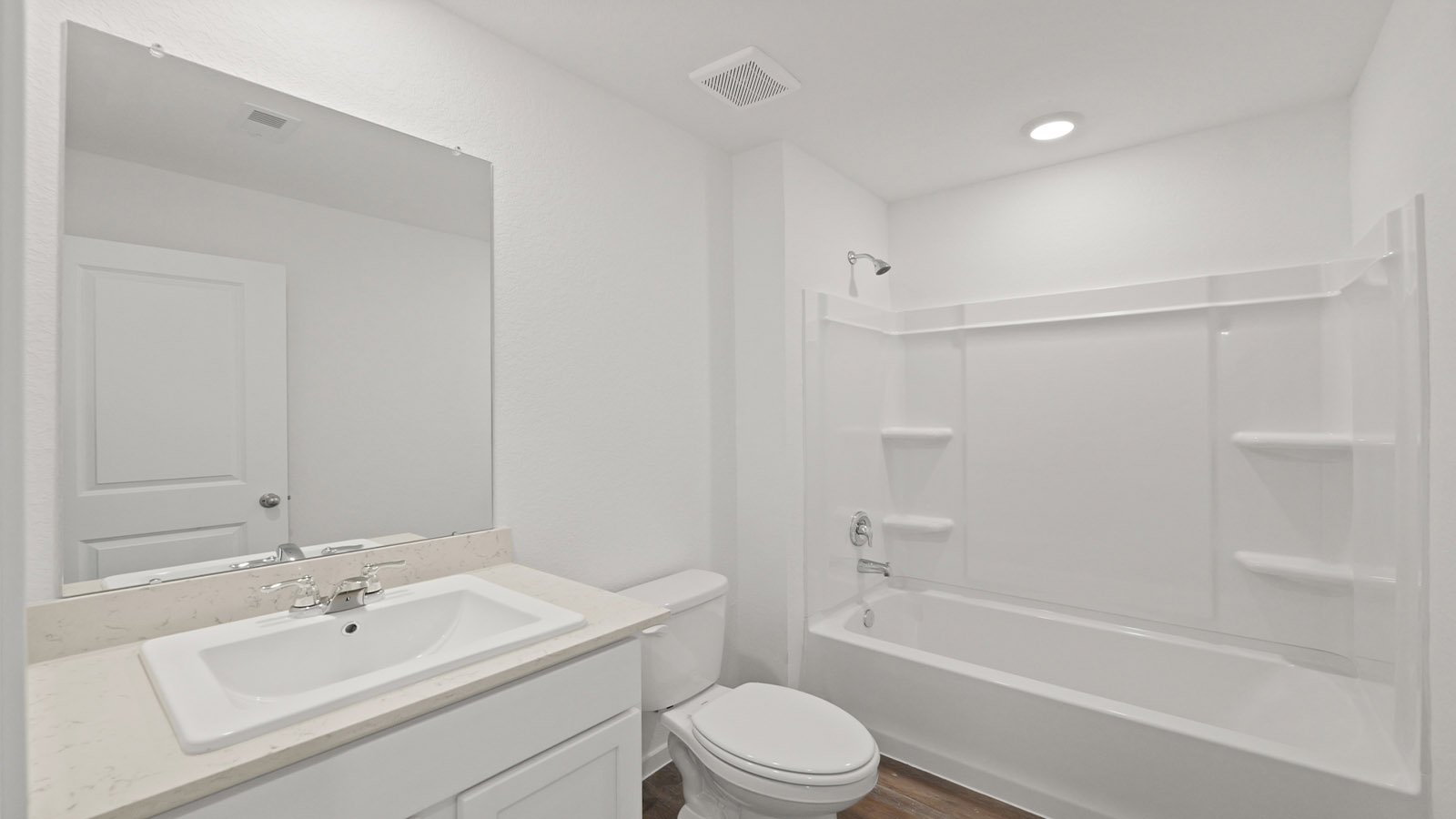 Secondary bathroom with tub/shower combo with quartz counter tops in Willis TX
