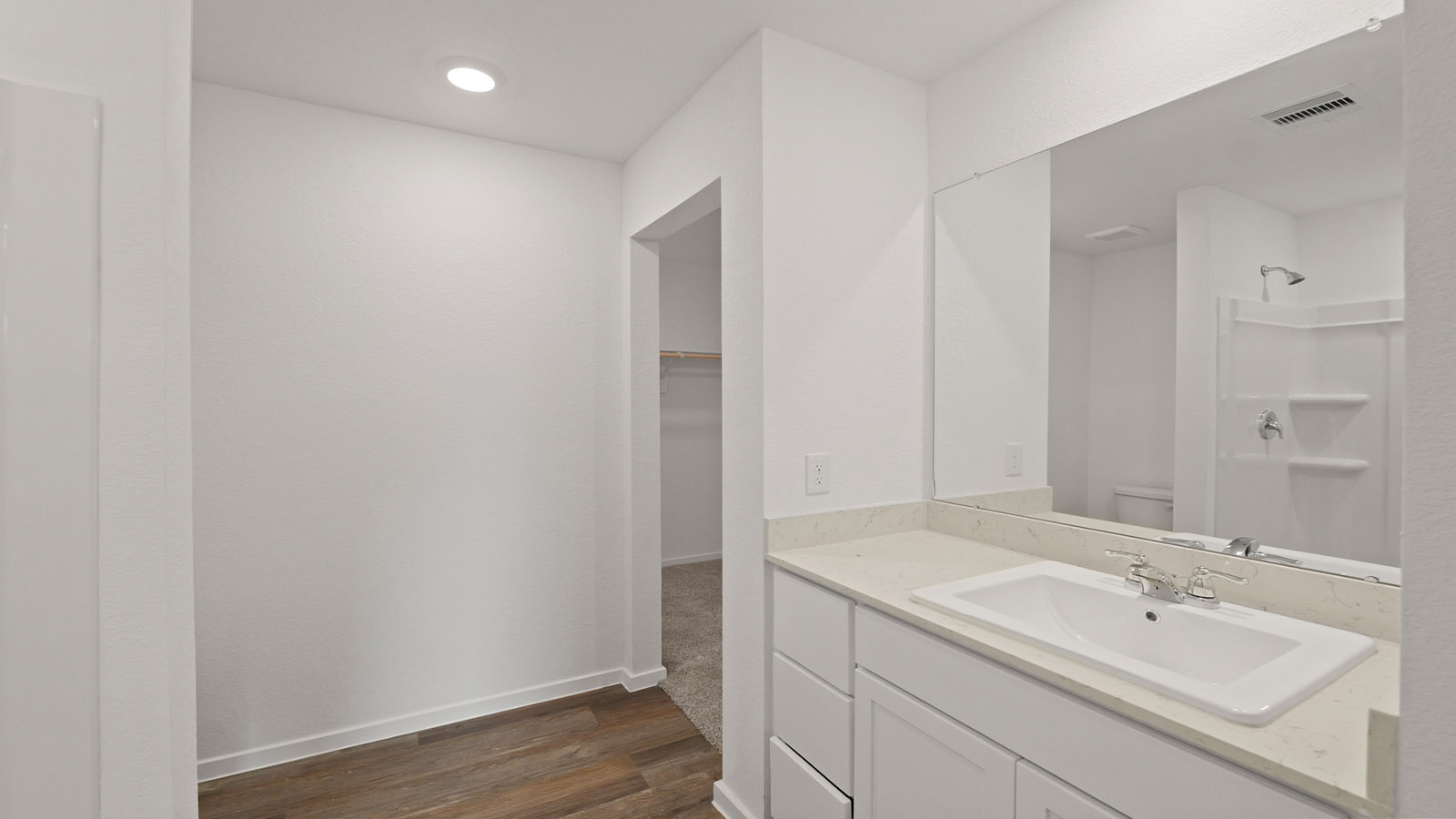 Primary bathroom with single sink with quartz counter tops in Willis TX