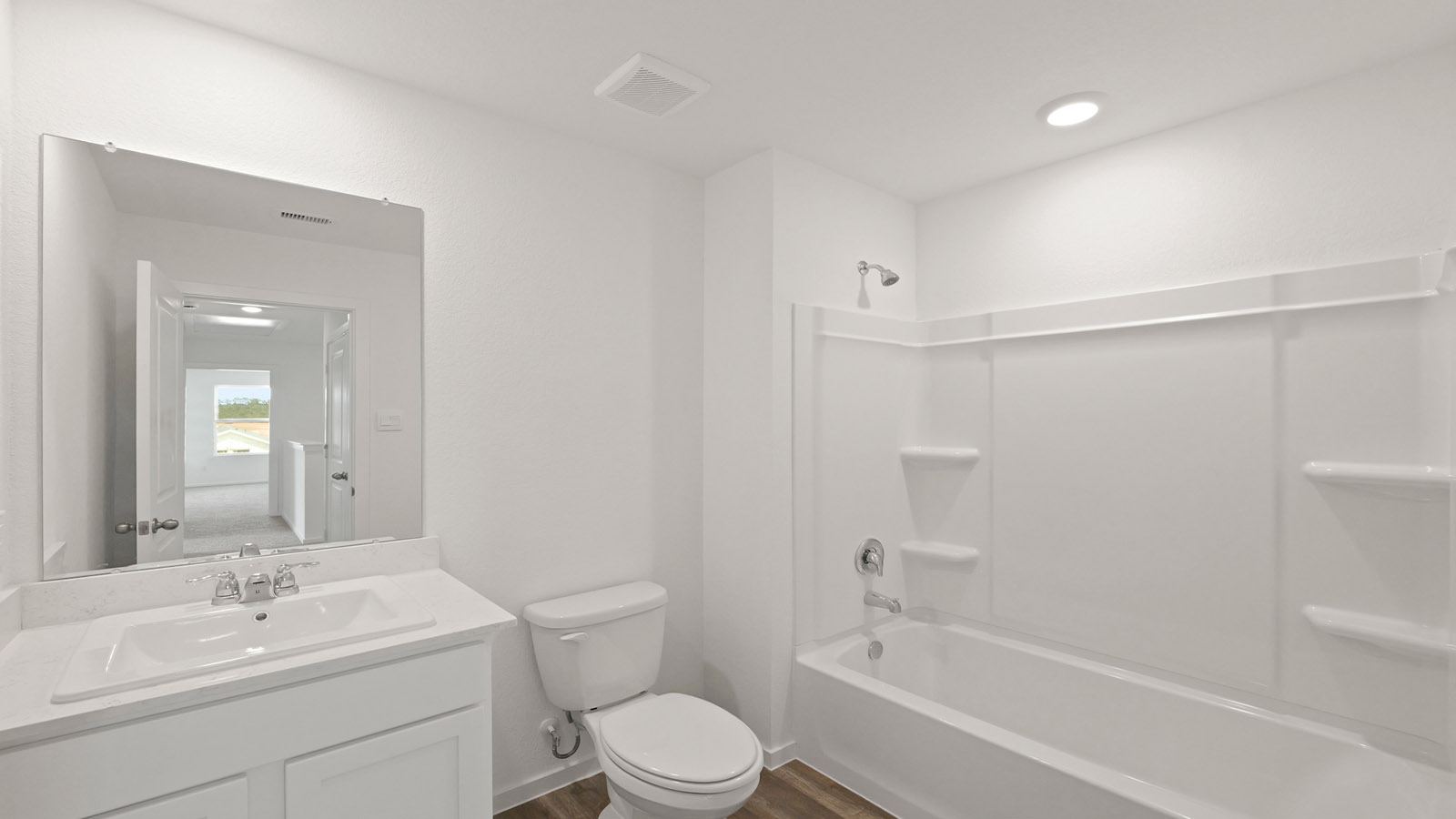 Secondary bathroom with tub/shower combo with quartz counter tops in Willis TX