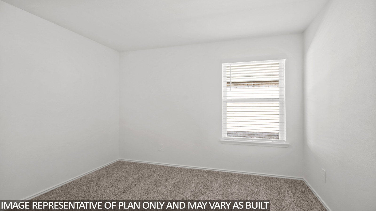 Secondary bedroom with windows, white walls, and light carpet.