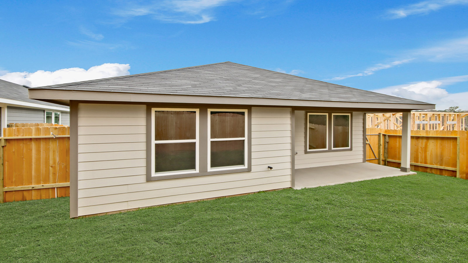 covered patio with overhead lighting