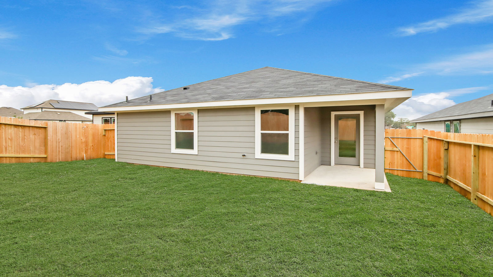 covered patio with overhead lighting