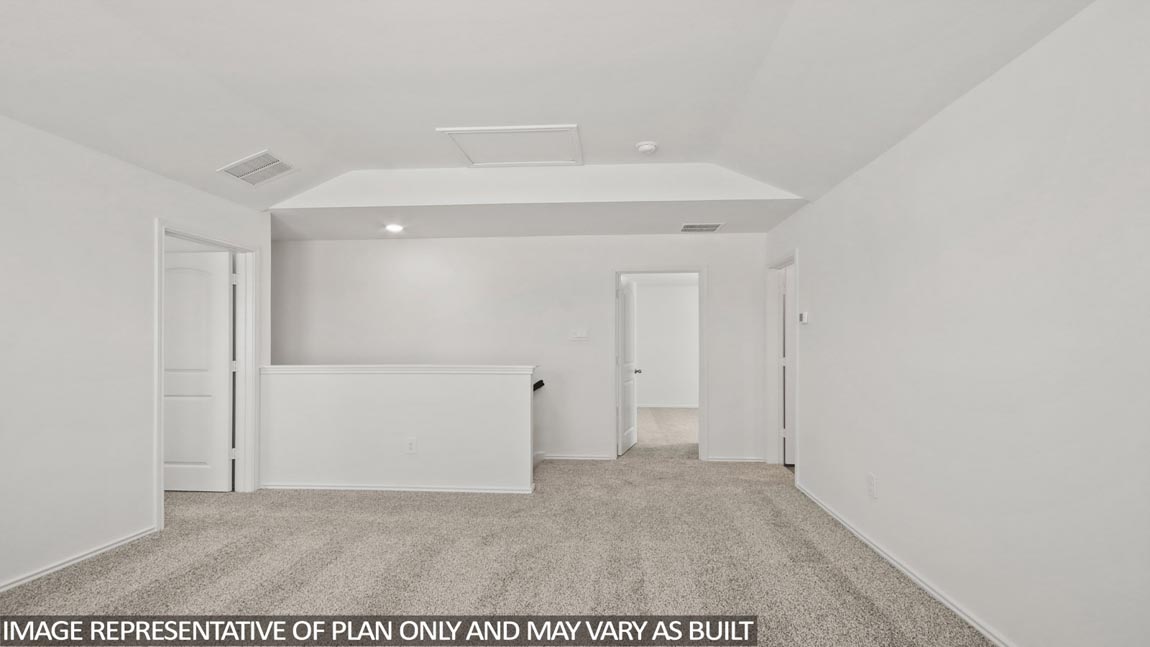 Second story game room with carpet flooring