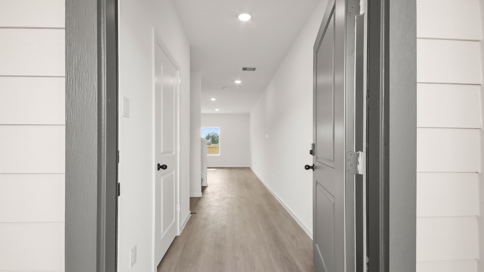 Entry hallway with vinyl flooring