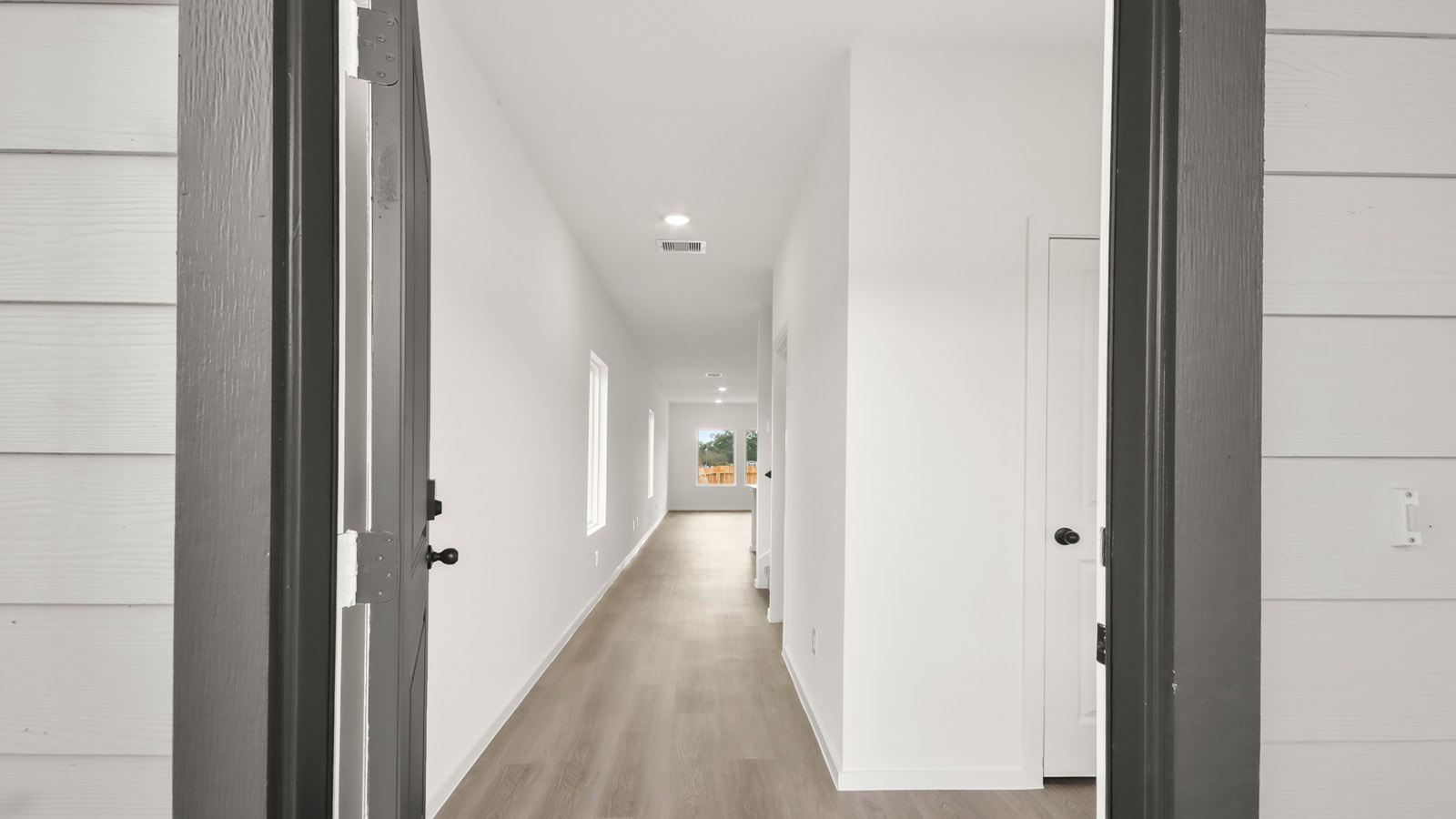 Entry hallway with vinyl flooring