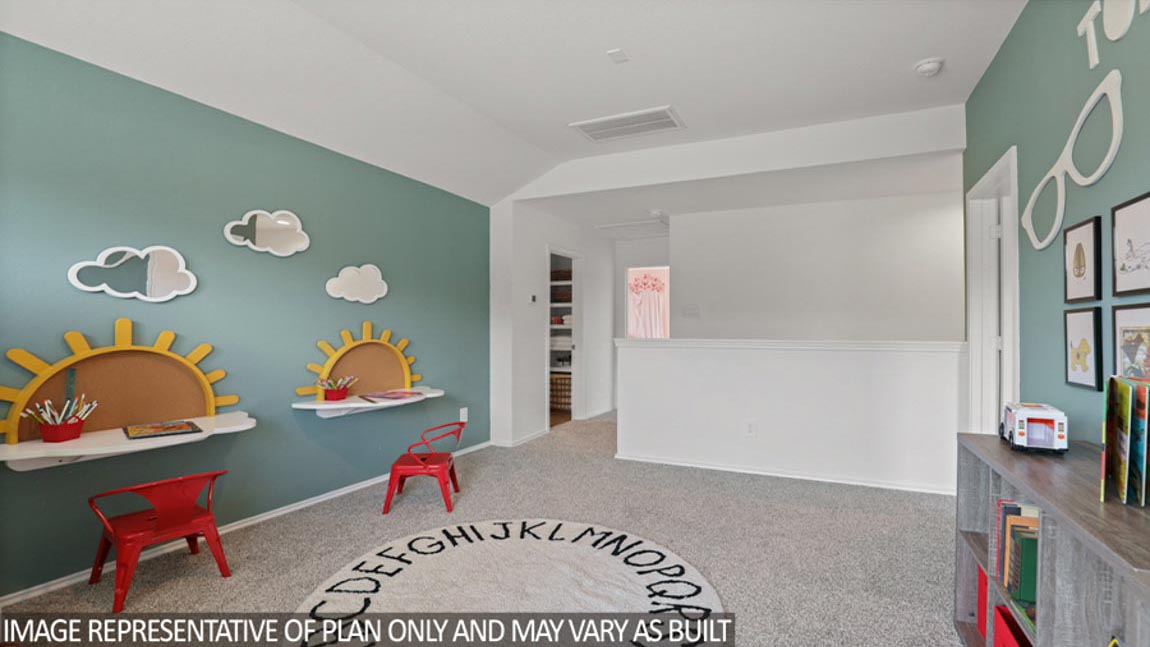 Large game room with windows, white walls, and light carpet.