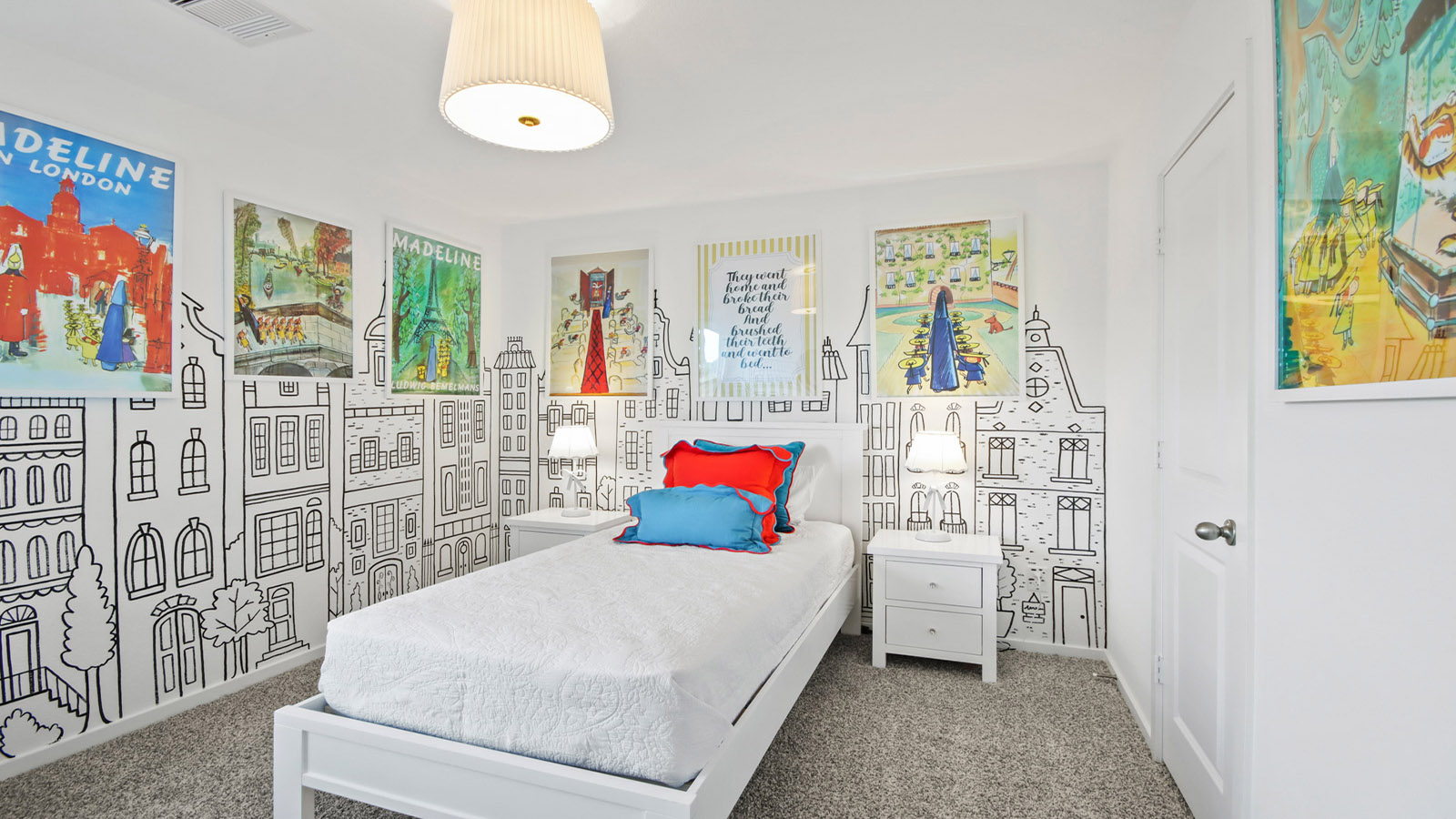 primary bedroom with large windows and carpet flooring