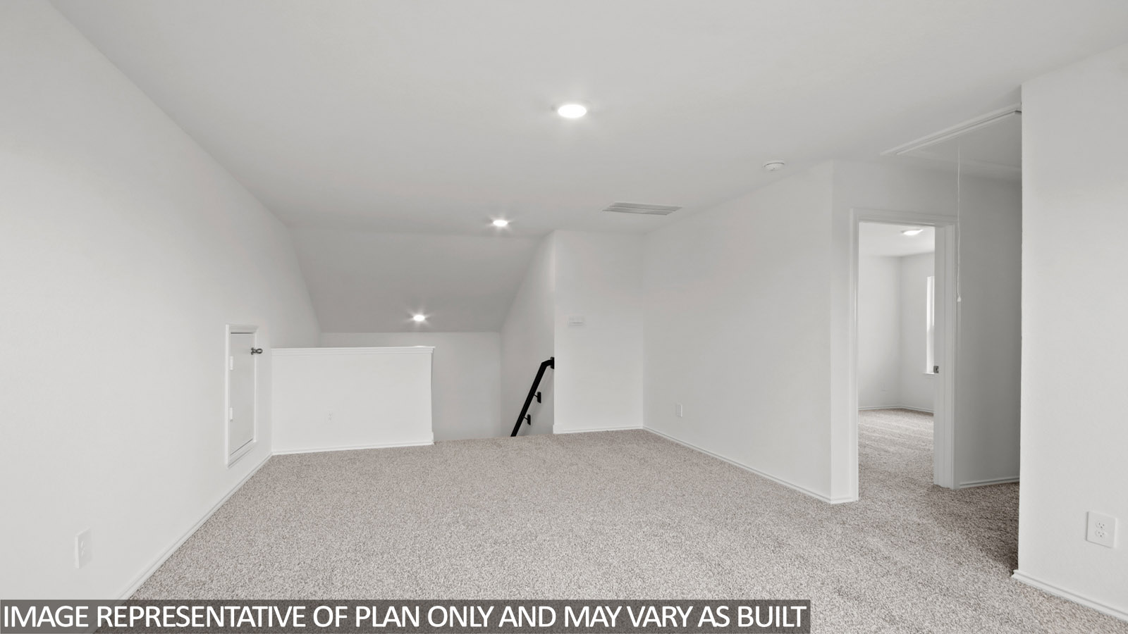 Large game room with windows, white walls, and light carpet.