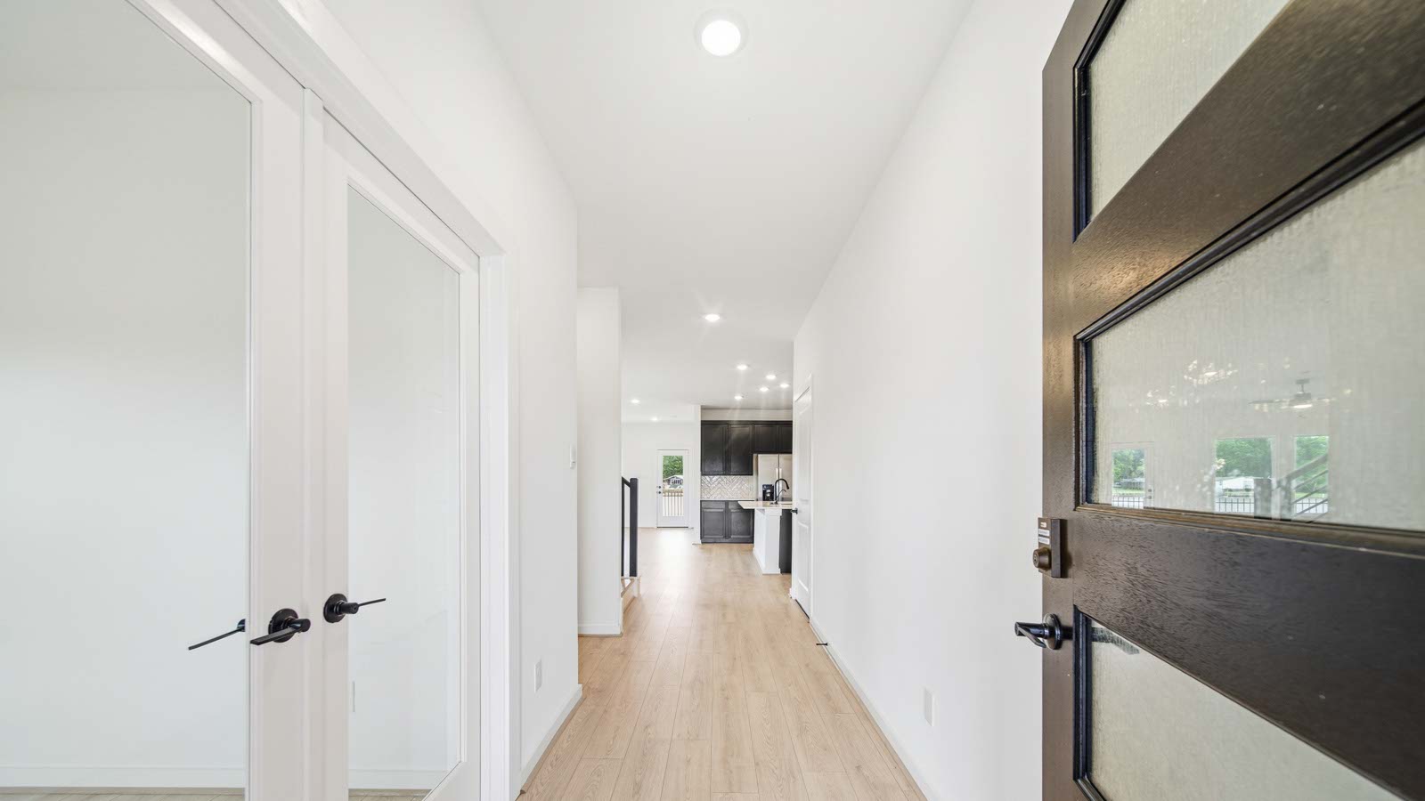 Entry hallway with vinyl flooring