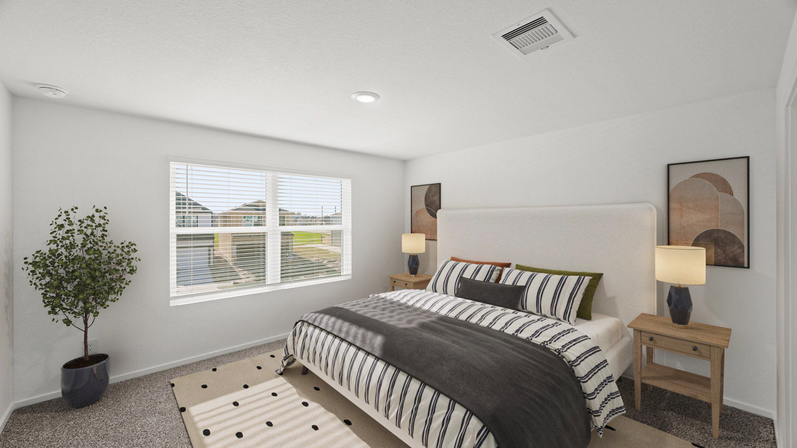 primary bedroom with bright windows