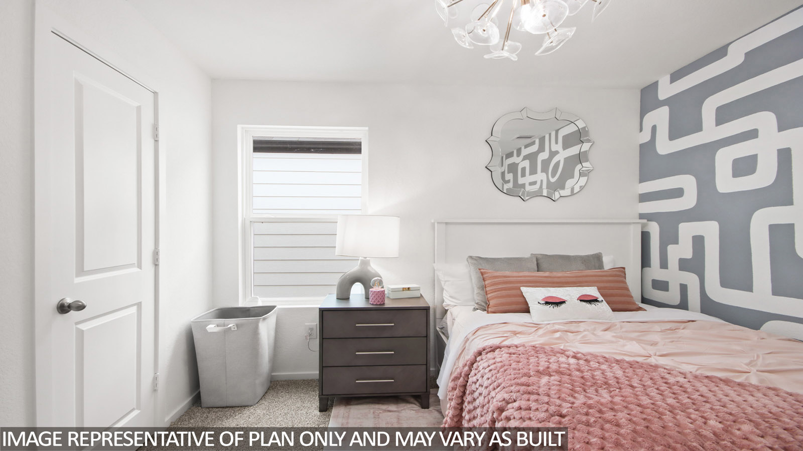 Secondary bedroom with carpet flooring