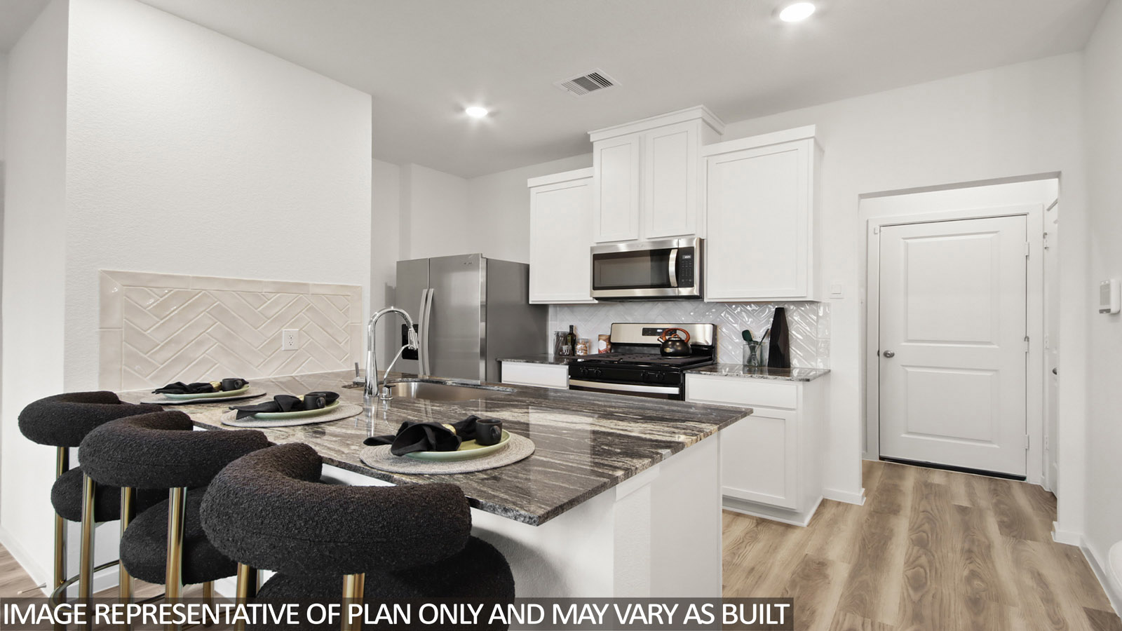 L- shaped kitchen with an island