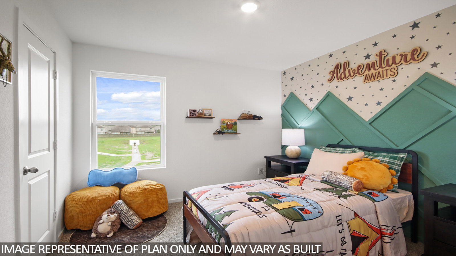 secondary bedroom with bright windows and a tall closet