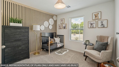secondary bedroom with carpet flooring