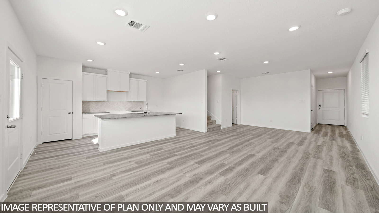 Open concept living, dining, and kitchen area