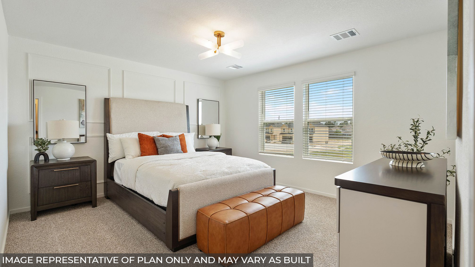 Primary bedroom with carpet flooring