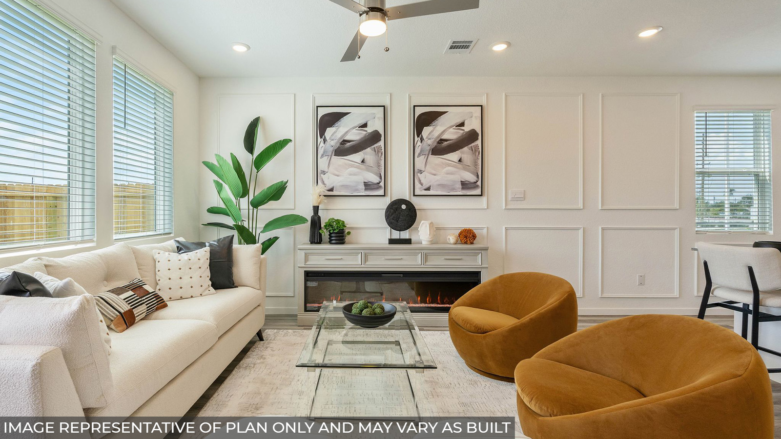 Spacious living area with vinyl flooring