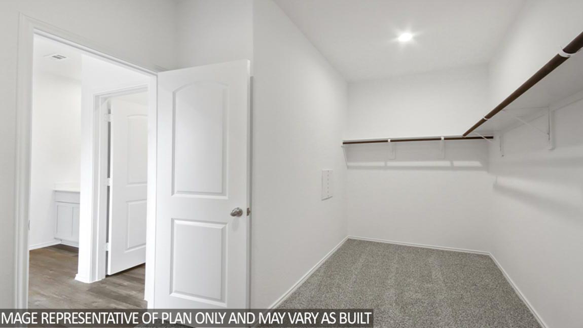 primary bedroom walk in closet